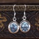 Boucles d'oreilles en argent et pierre topaze bleue