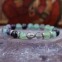 Bracelet bouddha et pierre fluorite