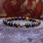 Bracelet bouddha et pierre mixte oeil de tigre