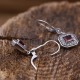 Boucles d'oreilles d'Exception en argent, pierre grenat et marcassite