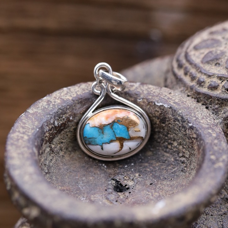 Pendentif en argent et pierre turquoise cuivrée