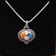 Pendentif en argent et pierre turquoise cuivrée