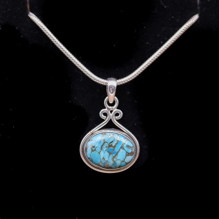 Pendentif en argent et pierre turquoise cuivrée