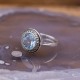 Bague d'exception en argent, émail noir, marcassites et Topaze Bleue