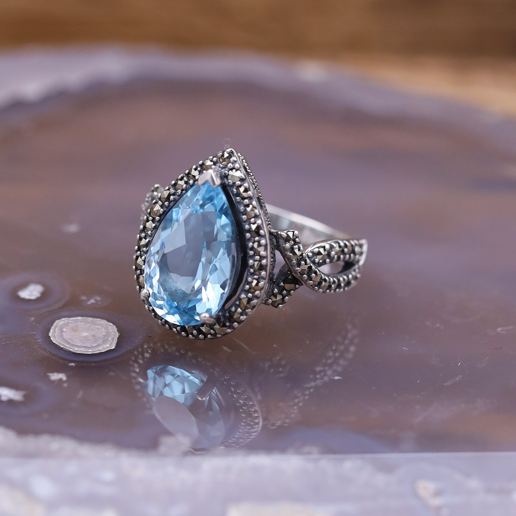 Bague d exception en argent marcassites et pierre topaze bleue