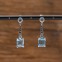 Boucles d'oreilles d'exception en argent, marcassites et pierre topaze bleue