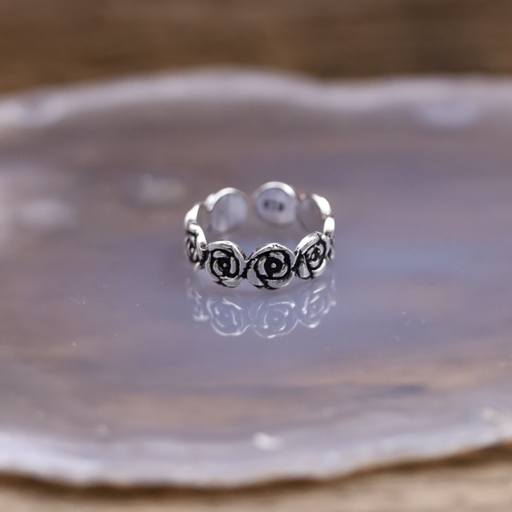 Bague de phalanges en argent à motif roses