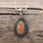 Pendentif en argent et pierre de soleil