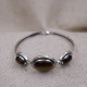 Bracelet rigide en argent et oeil de tigre