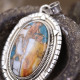 Pendentif en argent et turquoise cuivrée