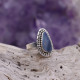 Bague en argent et opale bleue