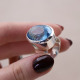 Bague en argent et topaze bleue