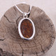 Pendentif en argent et ambre