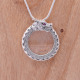 Pendentif en argent loupe